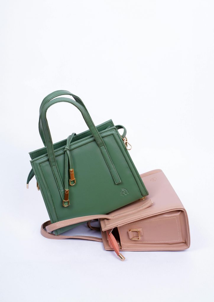 Stylish green and beige handbags in a studio setting with a white background, perfect for fashion showcases.